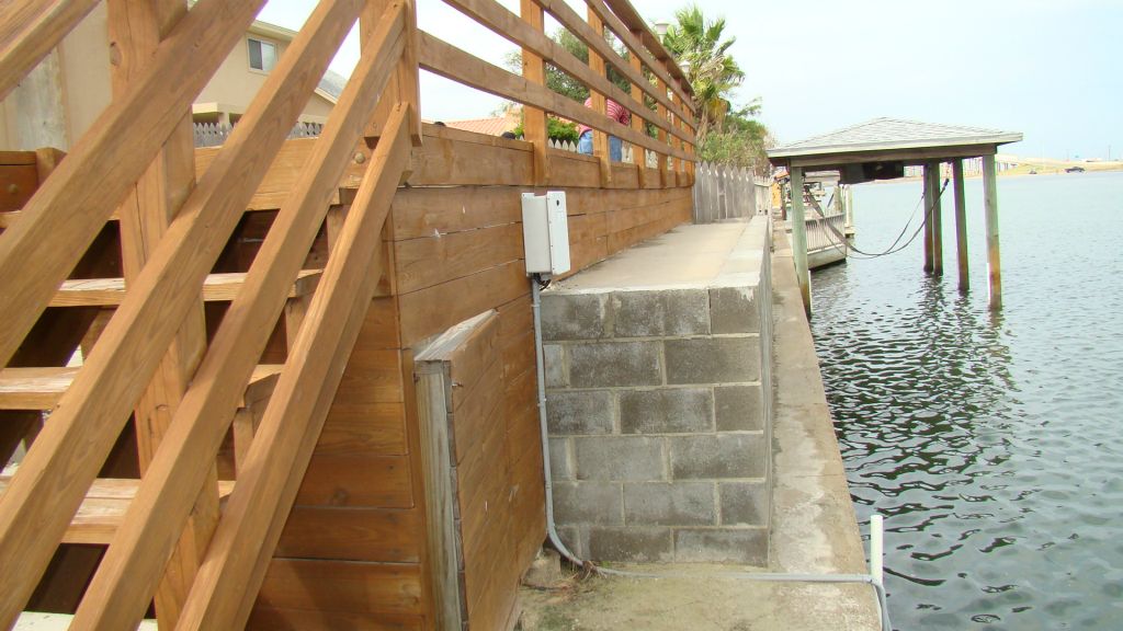 EXISTING WOOD DECK, CONCRETE STEPS and FLATWORK, HANDRAILS, BULKHEAD, STAIRS and POOL to be REPLACED